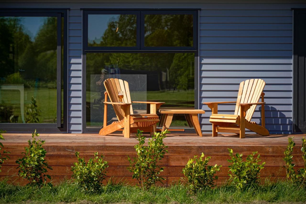 Parehua Resort Martinborough Esterno foto A deck with A-frame chairs